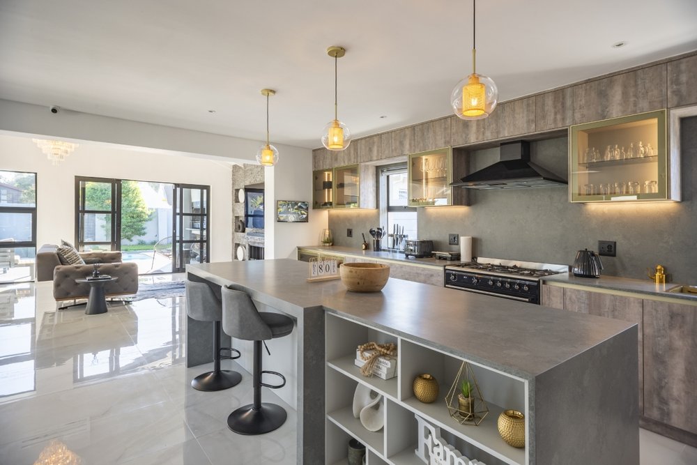 Kitchen island detail with glass-front cabinetry