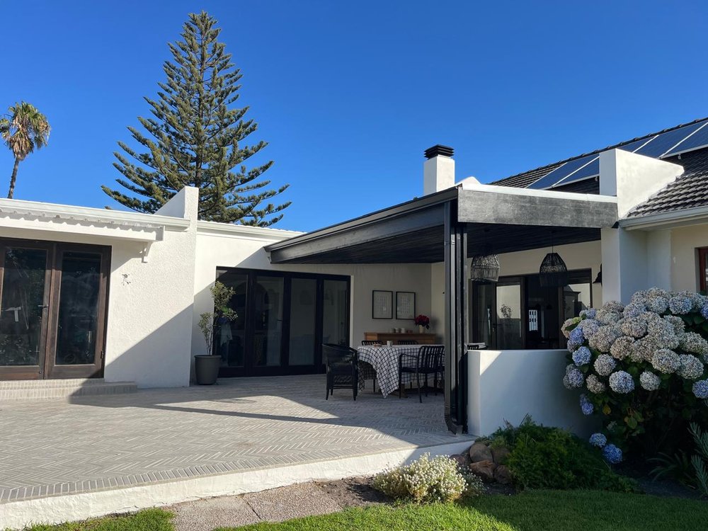 Exterior view of the covered patio and garden, alternate angle